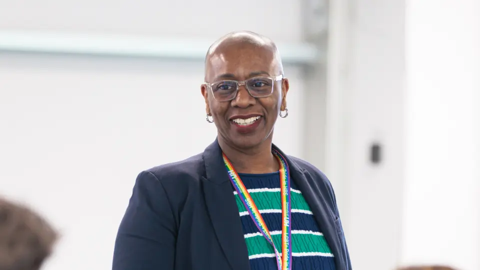Lecturer smiling to her class