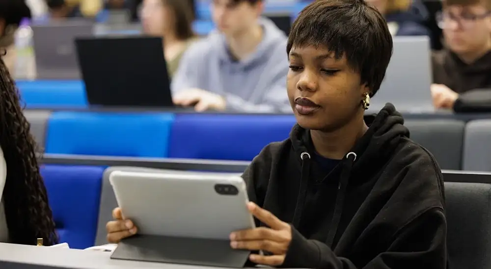 Student in an iPad