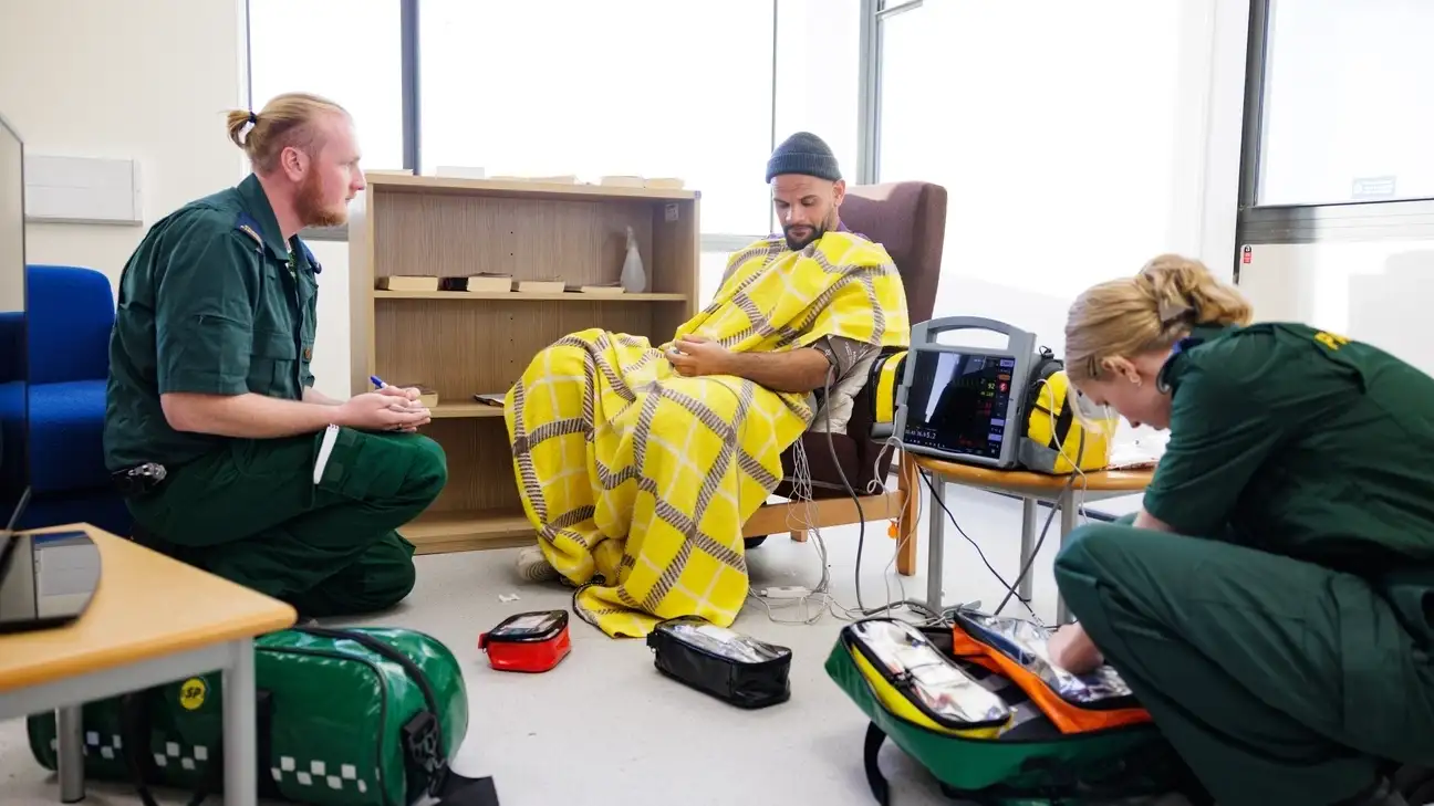 Paramedic students practicing a simulation