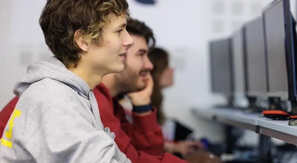 A student working on a desktop computer