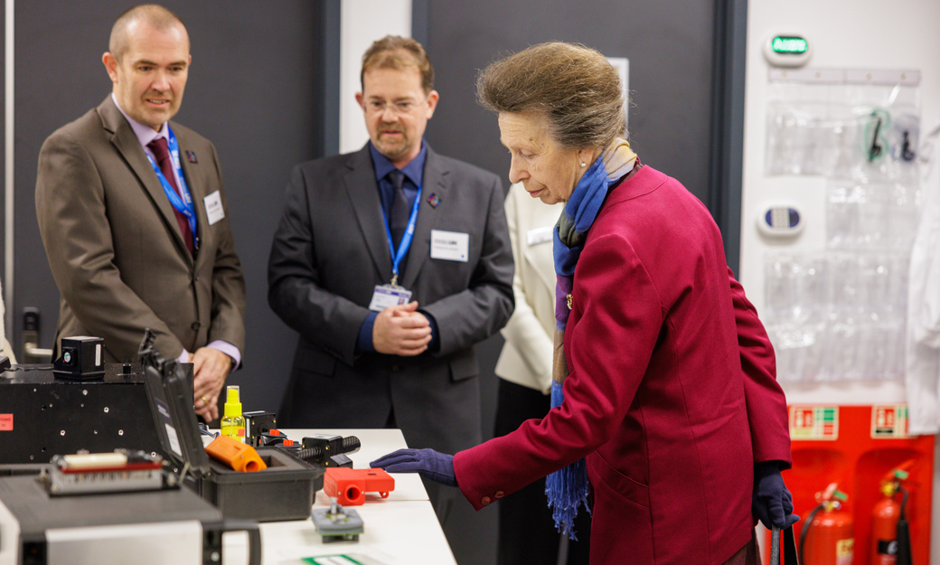 Princess Royal looking at student work