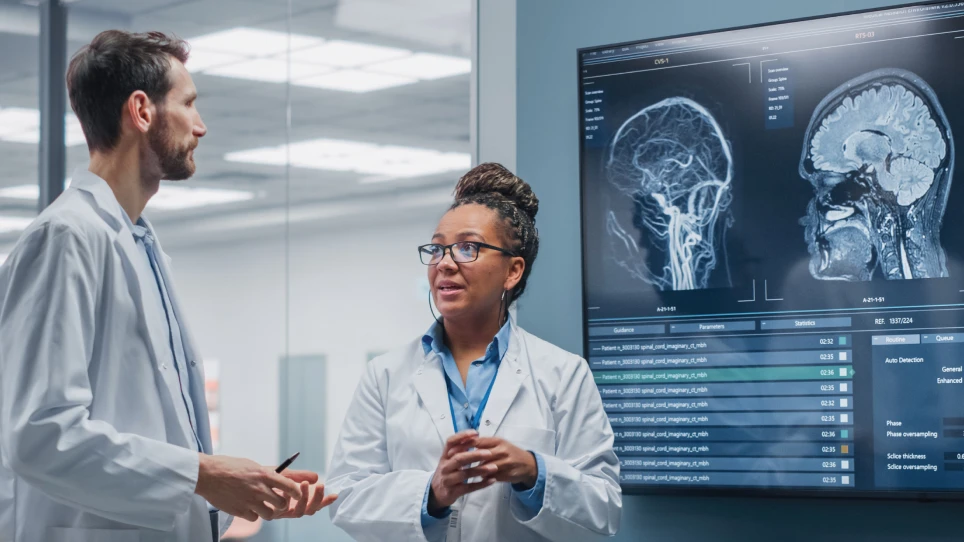 doctor in front of X-ray scan 