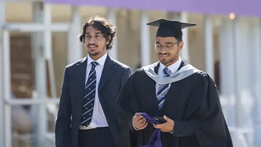 Two students at graduation