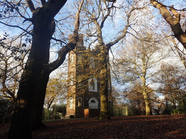A white and brown brick castle on a sunny day