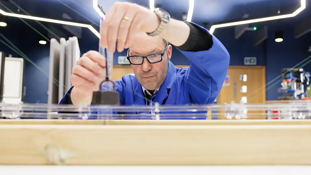 Person doing experiment header