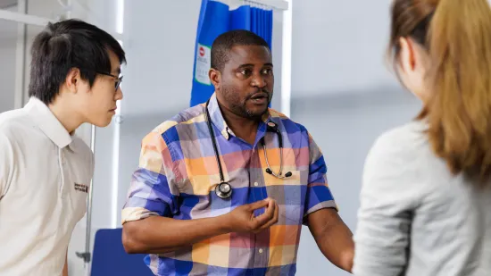 Doctors talking to students 