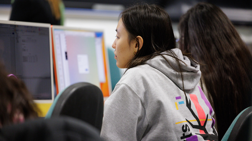 Two students hugging