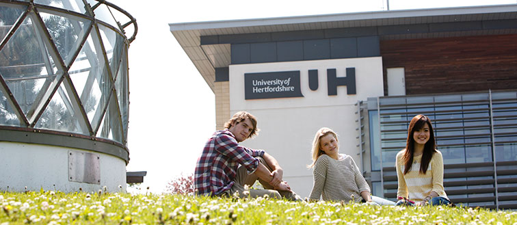 Students sitting outside de Havilland