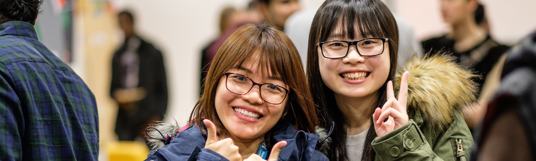 Two female students at event on campus