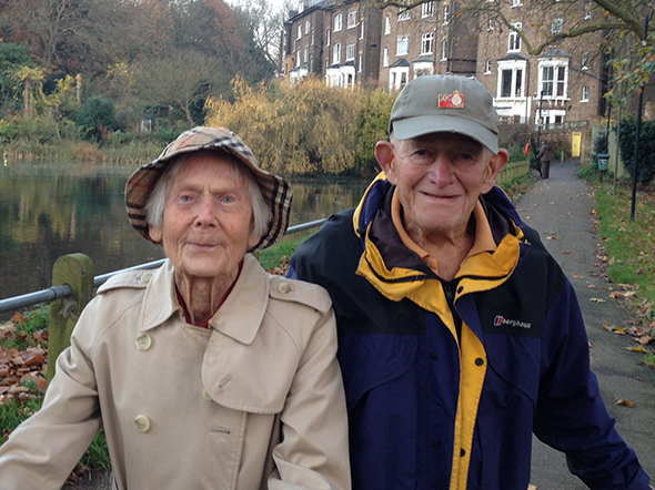 Photo of Rosemary's parents smiling by a river