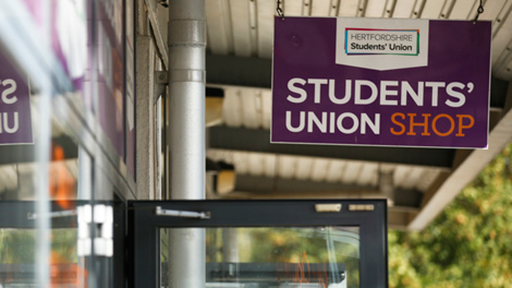 a sign for the student union shop