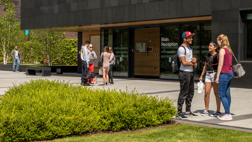 Students talking on campus 