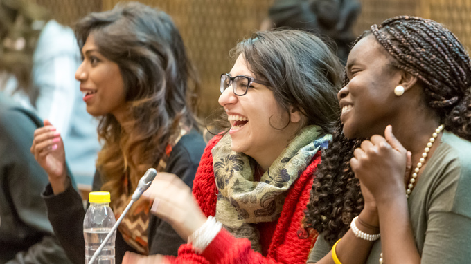 Students laughing in a lecture