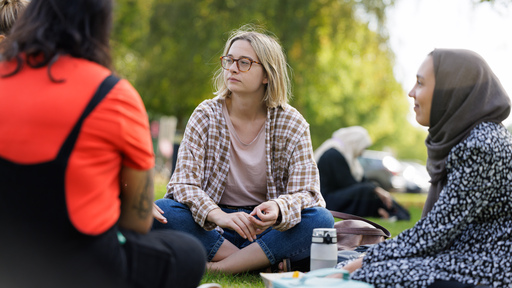 Students sat in a group talking