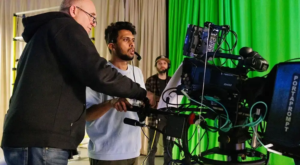 A student using a tv camera
