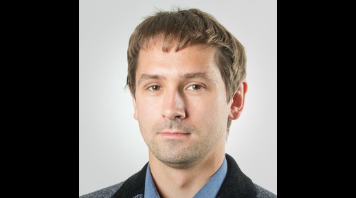A headshot of Dr Luke Wood