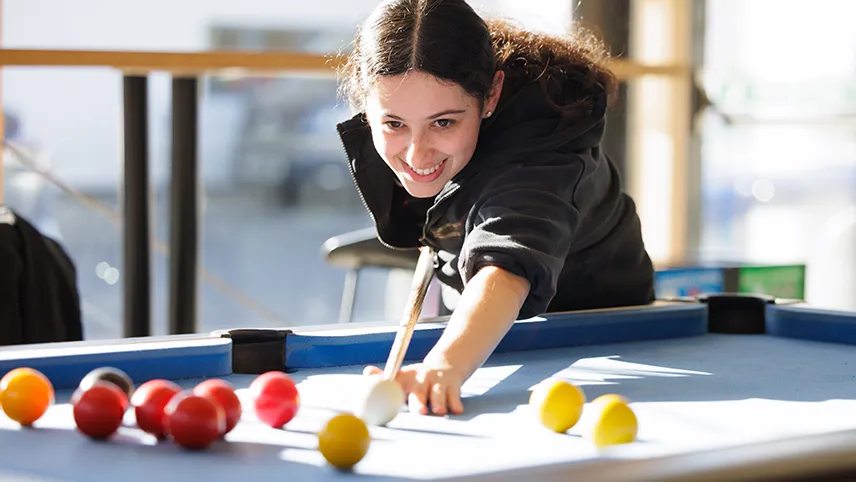 Person playing pool