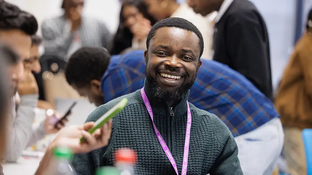 Student smiling header