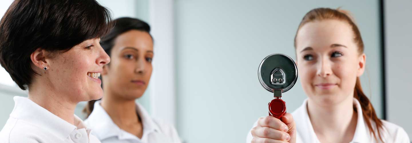 Female physio examining patient