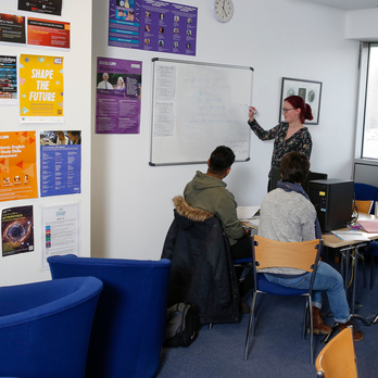 Three students working together