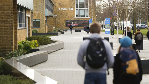 Students walking through College Lane campus