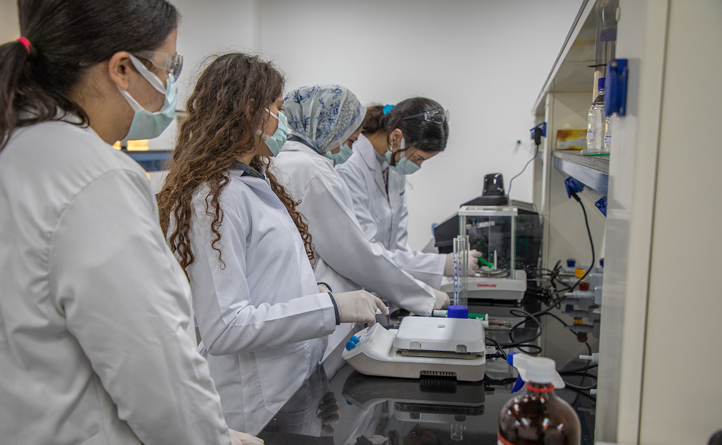 Science students in lab coats