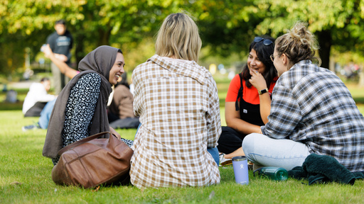 Students sat in a group outside