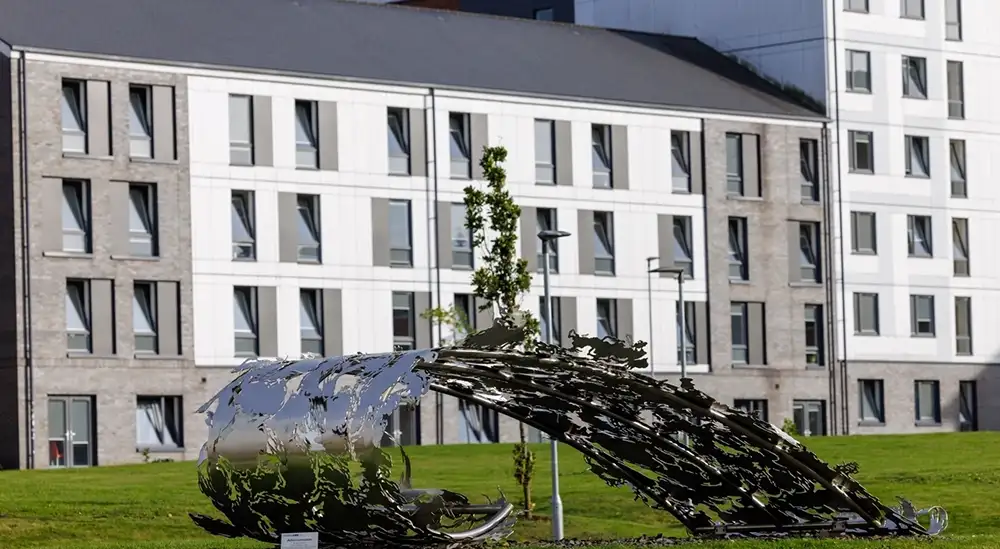 Art sculpture that looks like a wave made from metal