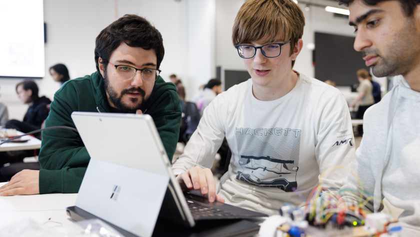 A student looking at an tablet working