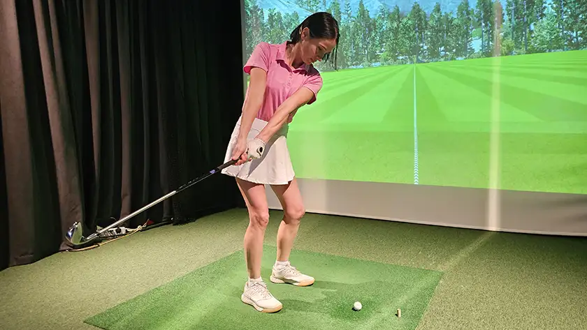 Person playing golf