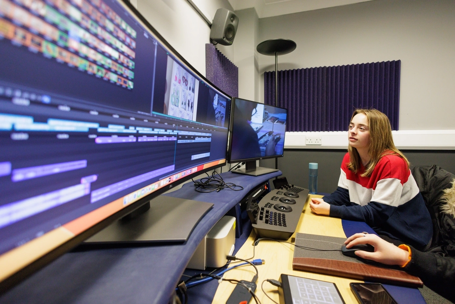 Person using edit suite