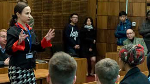 Academic debating in front of students in law court