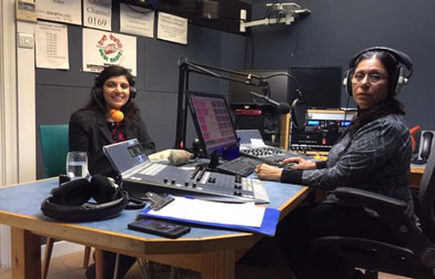 Two people in radio studio