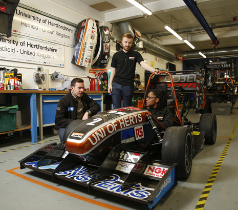 Students working on formula student car