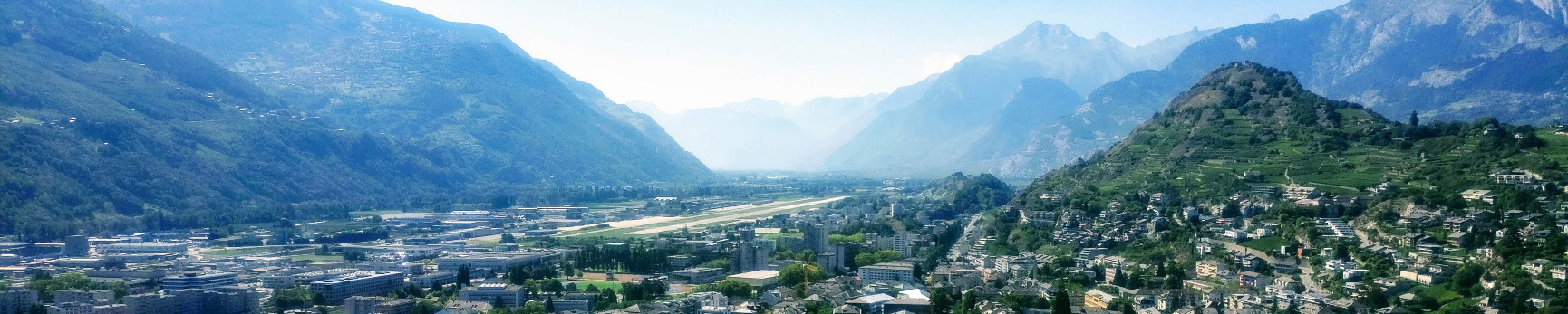 Town with mountains in the background