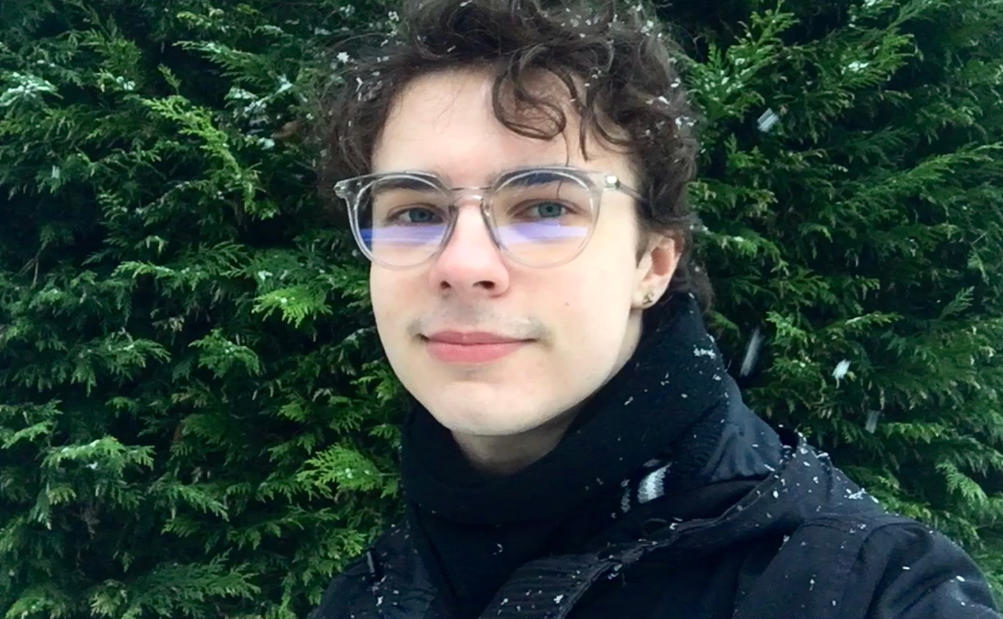 James Hatcher smiles to camera on a winter's day