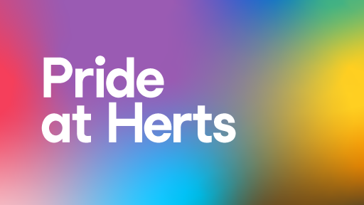 Colour background with text that reads 'Pride at Herts'