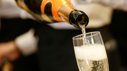 Champaign being poured for the finalists