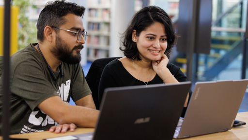 Student getting support on laptop 
