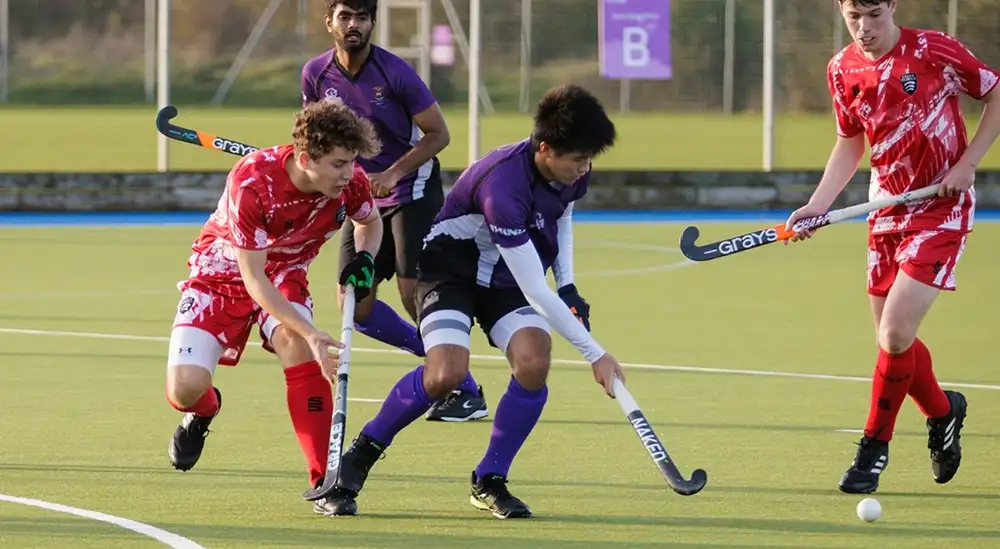 People playing Hockey 