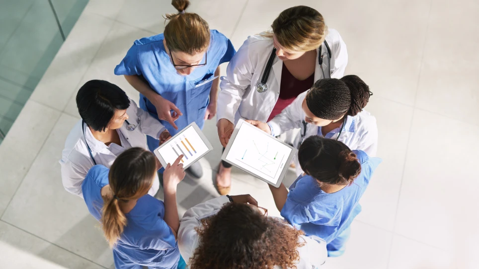 Four doctors talking