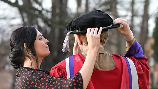 Two students at graduation