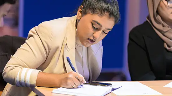 Person talking notes