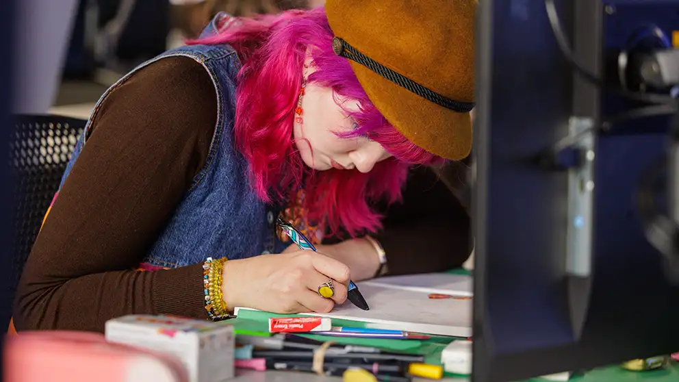 Student working header