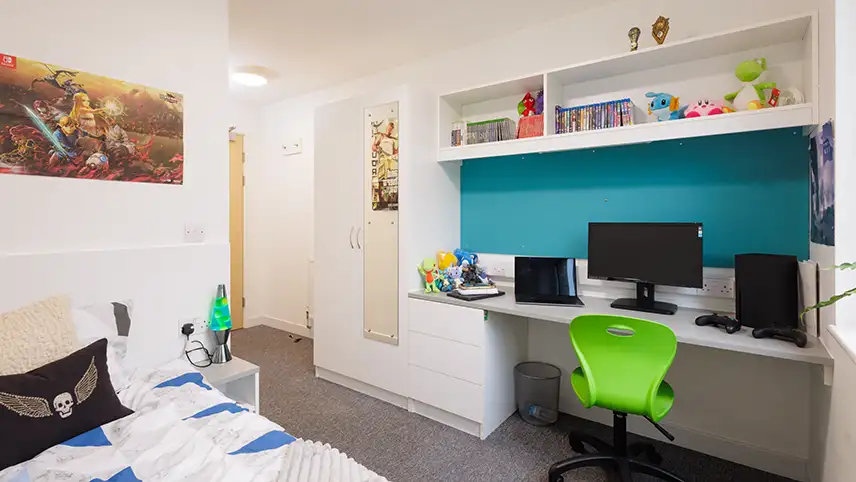 Waredrobe, bed and desk with screen