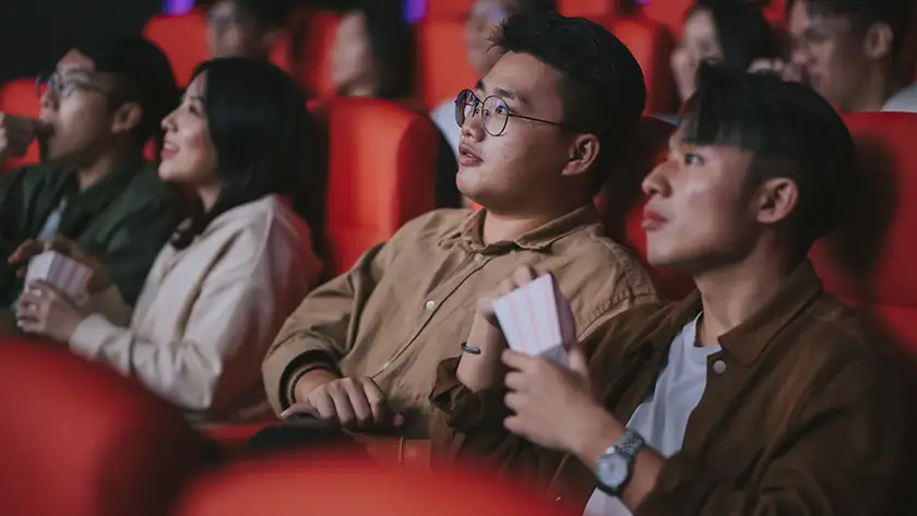 People in cinema seats