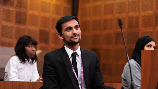 Person in a mock court room