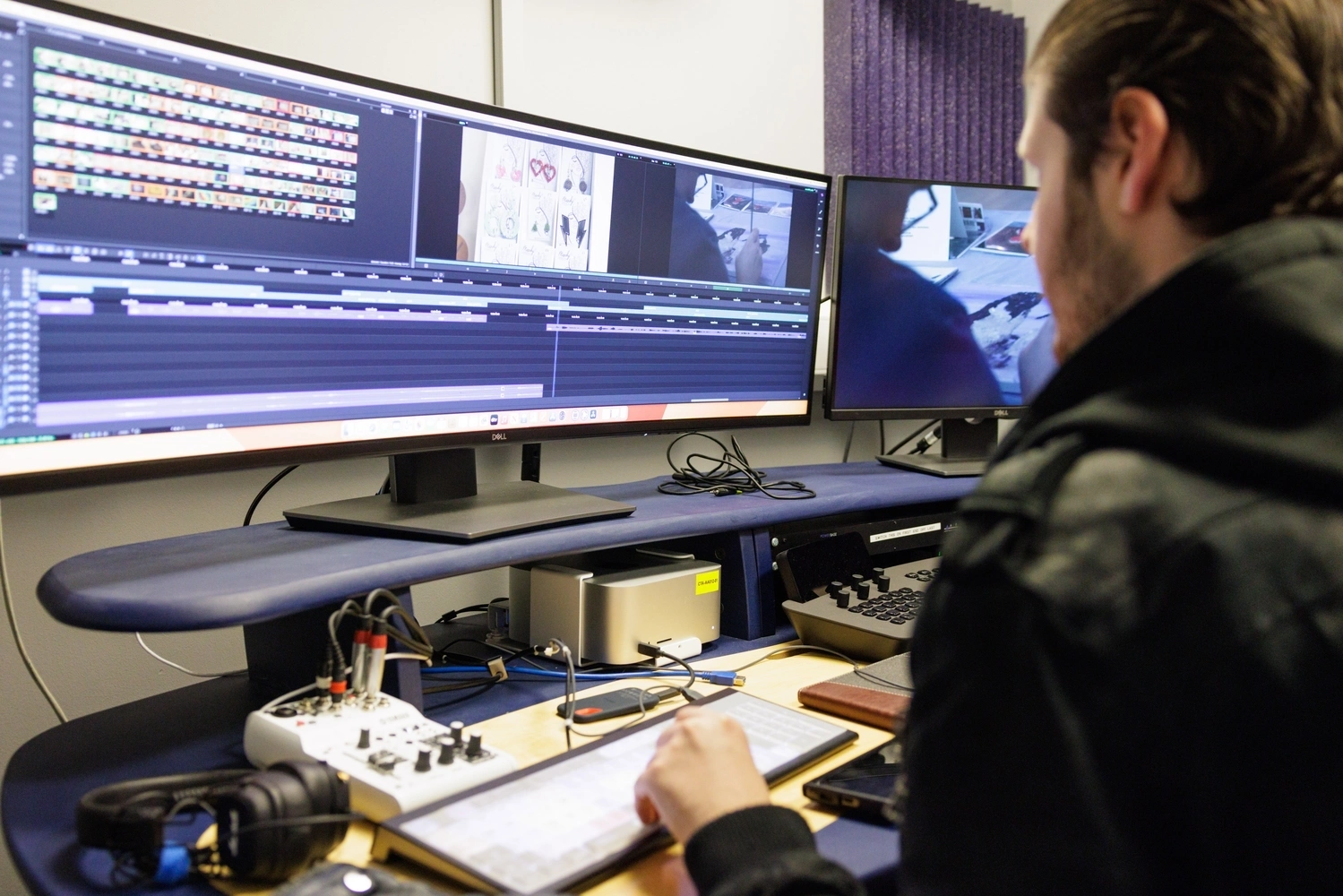 Person using edit suite
