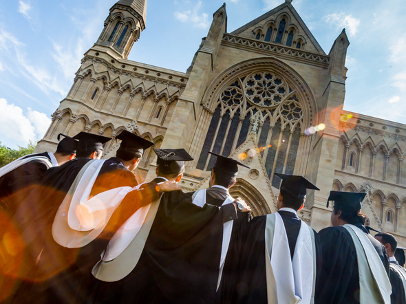 Graduates in front of cathedral