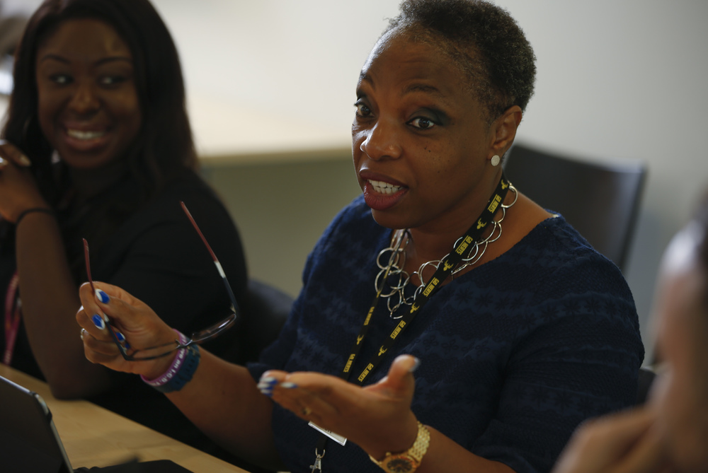 BAME woman talking in meeting